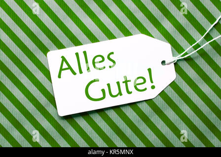 Etikett auf grüne Verpackung Papier, glücklich bedeutet beste Wünsche Stockfoto