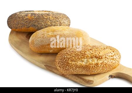 drei Brote auf das Holzbrett Stockfoto