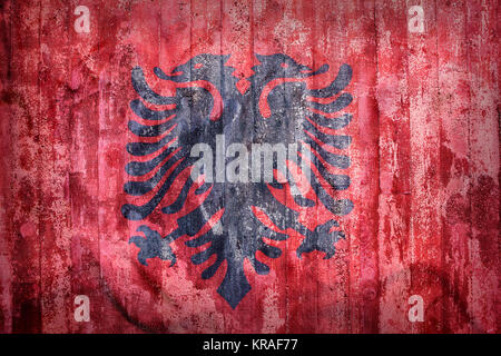 Grunge-Stil von Albanien Flagge auf eine Mauer für Hintergrund Stockfoto