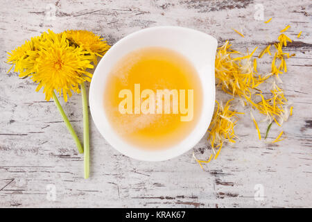 Löwenzahn honig Hintergrund, pflanzliche Heilmittel. Stockfoto