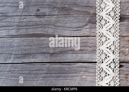 Spitze am alten Holz Hintergrund Stockfoto