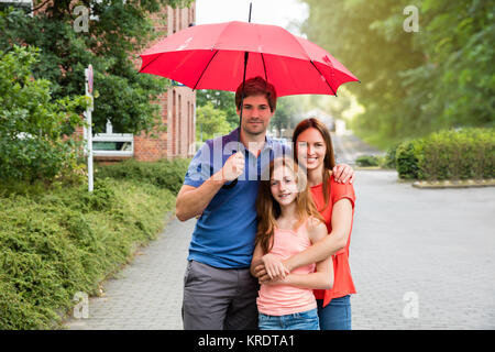 Portrait von ein Paar mit Ihrer Tochter Stockfoto