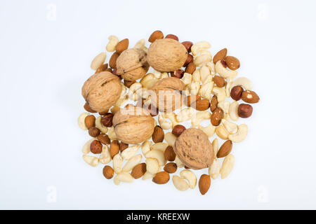 Hintergrund Der gemischte Nüsse - Haselnüsse, Walnüsse, Cashewnüsse, Pinienkerne Stockfoto