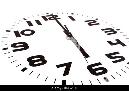 Uhr isoliert auf weisse Markierung die sechs Uhr. Der Schwerpunkt liegt in der Stunde. Stockfoto