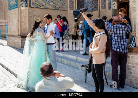 Junge usbekische Modelle Teil in ein Foto schießen, Buchara, Usbekistan, Stockfoto