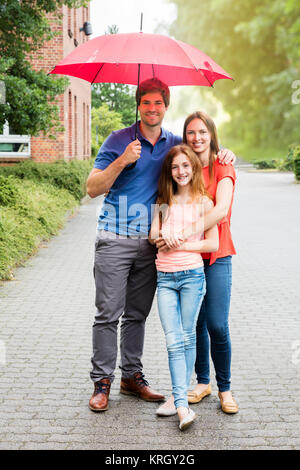 Portrait von ein Paar mit Ihrer Tochter Stockfoto