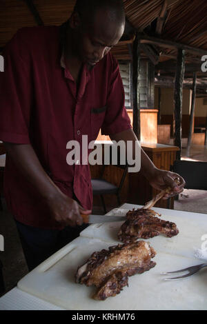 Nyama Choma, traditionelles Straßenessen oder kenianischer Grill, Nairobi, Kenia, Ostafrika Stockfoto