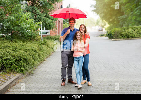 Portrait von ein Paar mit Ihrer Tochter Stockfoto