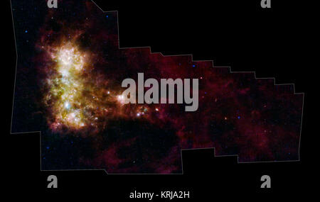 Die IR-Porträt der Kleinen Magellanschen Wolke, von NASA's Spitzer Space Telescope, offenbart die Sterne und Staub in dieser Galaxie, wie noch nie zuvor gesehen. Die Kleine Magellansche Wolke ist eine in der Nähe satellitengalaxie unserer Milchstraße, ca. 200.000 Lichtjahre entfernt. Das Bild zeigt den Hauptteil der Kleinen Magellanschen Wolke, die sich aus der 'Bar' und 'Tragfläche' auf der linken Seite und die 'tail' auf der rechten Seite. Die Bar enthält sowohl alte Sterne (in blau) und junge Sterne leuchten ihre natal Staub (grün/rot). Die Flügel enthält hauptsächlich junge Sterne. Der Schwanz enthält nur g Stockfoto