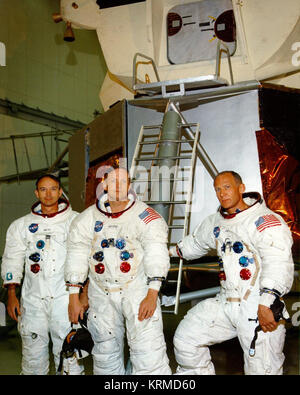 Mike Collins, Neil Armstrong und Buzz Aldrin (von links nach rechts) posieren vor ein LM Mock-up Stockfoto