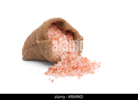 Himalaya Pink salt in sackleinen Tasche isoliert auf weißem Stockfoto