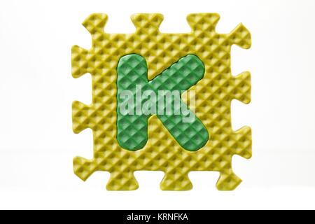 Buchstabe k Gummi puzzle Stockfoto