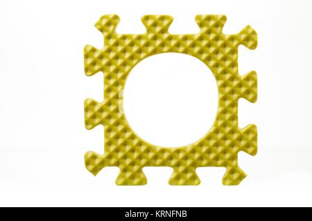 Buchstabe o Gummi puzzle Stockfoto