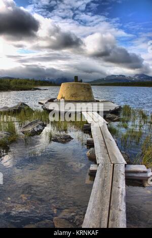 Dreiländer-Cairn an der Grenze zwischen Schweden, Norwegen und Finnland Stockfoto