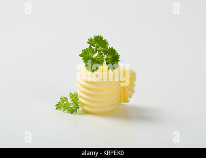 Butter mit Petersilie curl Stockfoto