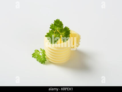 Butter mit Petersilie curl Stockfoto