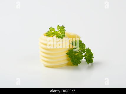 Butter mit Petersilie curl Stockfoto