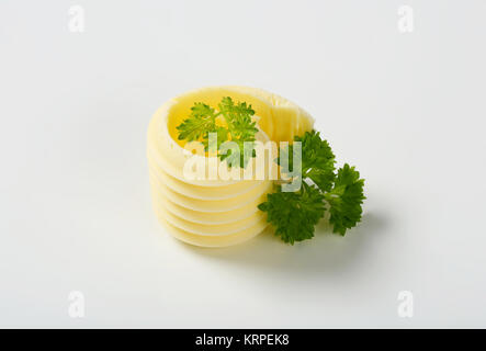 Butter mit Petersilie curl Stockfoto