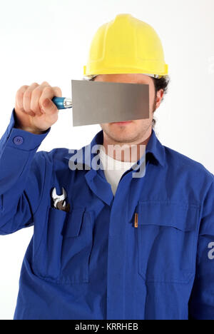 Bauarbeiter Mit Blaumann, Bauhelm Und Werkzeug - Bauarbeiter mit Werkzeugen Stockfoto