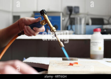 Der Workshop Handwerker, Sonnenbaden gold Brenner Stockfoto