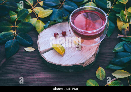 Tee in einem transparenten Becher, vintage Toning Stockfoto