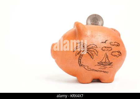 Geld sparen für Ferien in einem Sparschwein - Seitenansicht Stockfoto