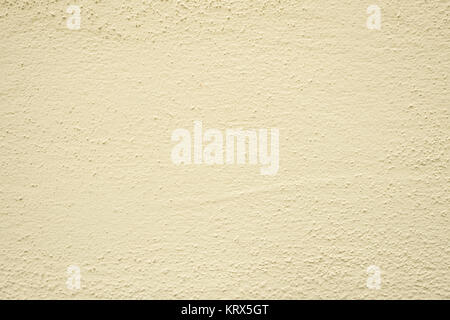 Putz in beige an einer Wand Stockfoto