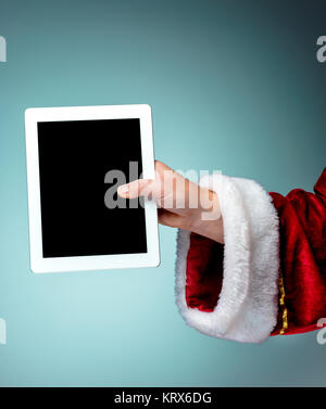 Santa Claus holding Laptop Stockfoto