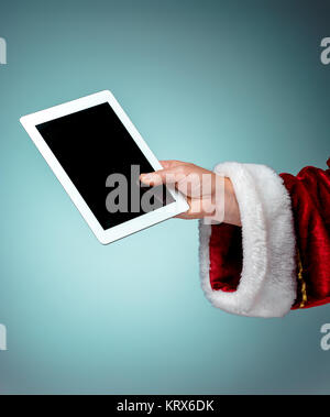 Santa Claus holding Laptop Stockfoto
