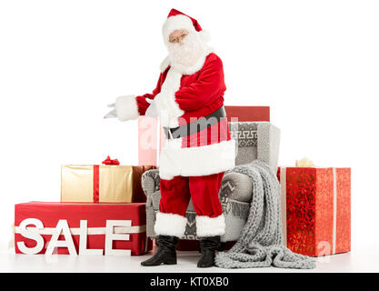 Santa Claus mit Verkauf Zeichen Stockfoto