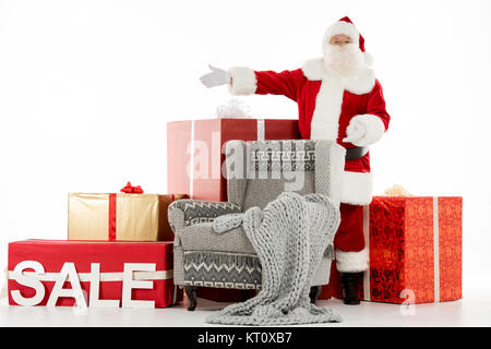 Santa Claus mit Verkauf Zeichen Stockfoto