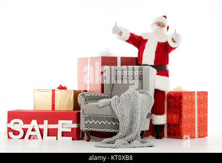 Santa Claus mit Verkauf Zeichen Stockfoto