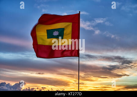 Winkende Cartagena Flagge wieder Sonnenuntergang Stockfoto