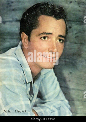 John Derek war ein US-amerikanischer Schauspieler, Regisseur und Fotograf, der in den 1950er Jahren für seine Rollen in Filmen bekannt war Dieses Bild fängt Derek in den frühen Stadien seiner Karriere ein, eine prominente Figur in Hollywood zu seiner Zeit. Stockfoto
