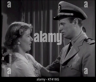 Ein Trailer-Screenshot aus „Panik in den Straßen“, einem Film aus den 1950er Jahren, der eine angespannte Krise der öffentlichen Gesundheit in New Orleans darstellt. Der Film konzentriert sich auf die Bemühungen der Gesundheitsbehörden, einen tödlichen Ausbruch von Krankheiten einzudämmen. Stockfoto