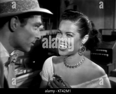 Lee Van Cleef und Dona Drake spielen 1952 die Hauptrollen im Kriminalthriller *Kansas City Confidential*. Der Film ist bekannt für seine packende Handlung und starke Darbietungen der Besetzung. Stockfoto