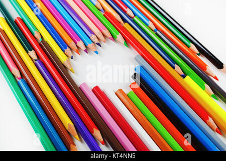 Bleistifte und Herz Stockfoto