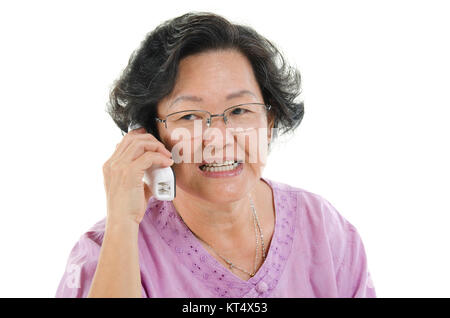 Ältere Erwachsene Frau am Telefon Stockfoto