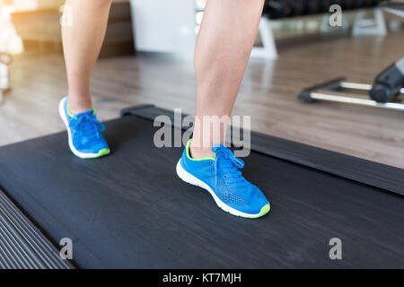 Frau auf Laufband Stockfoto