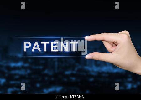 Hand klicken Patent-Taste Stockfoto