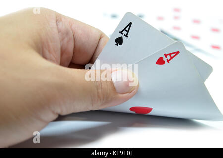 Spielkarten in der hand Stockfoto
