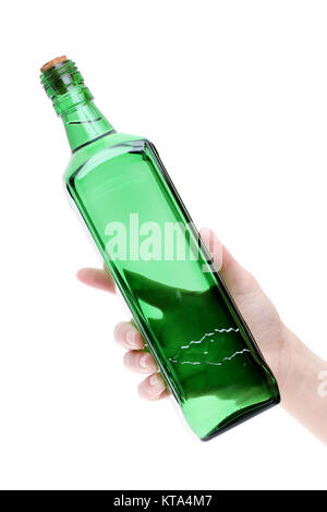 Hand mit grünem Glas Flasche auf weißem Hintergrund Stockfoto