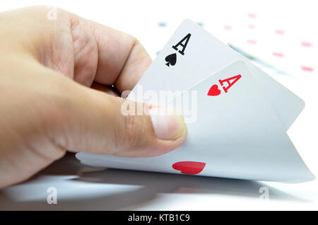 Hand mit poker karten Stockfoto