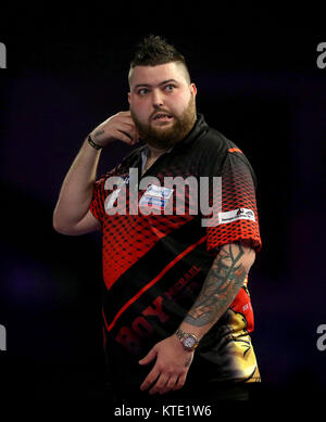 Michael Smith reagiert während der Tag zehn der William Hill World Darts Championship im Alexandra Palace, London. Stockfoto
