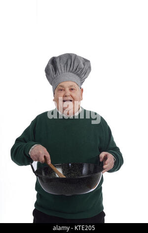 Ältere Menschen kochen auf Weiß Stockfoto