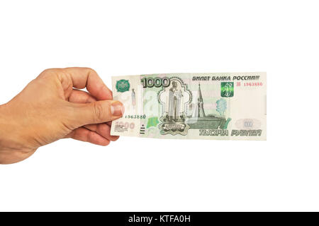 Mann Hand Geld, die gemeinsame Nutzung von Tausend Rubel Banknoten. Auf weissem Hintergrund. Hand geben Rubel Banknoten in finanziellen, Geldwechsel ein Stockfoto