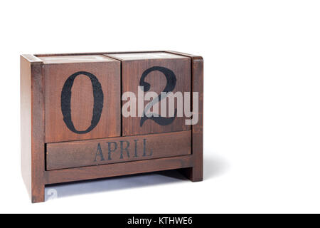 Holz- Ewiger Kalender bis April eingestellt 2. Stockfoto