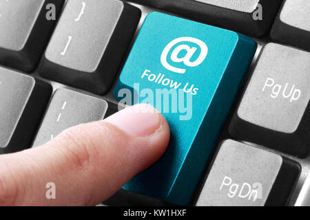 Folgen Sie uns auf der Tastatur Stockfoto