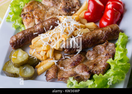 Nahaufnahme der traditionellen Schwein mit Pommes frites Stockfoto