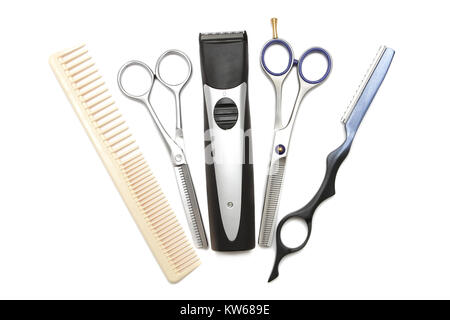 Friseursalons Industrie. Professionelle Friseursalons tools. Kamm, Schere, Scherer und Bartschneider auf weißem Hintergrund Stockfoto